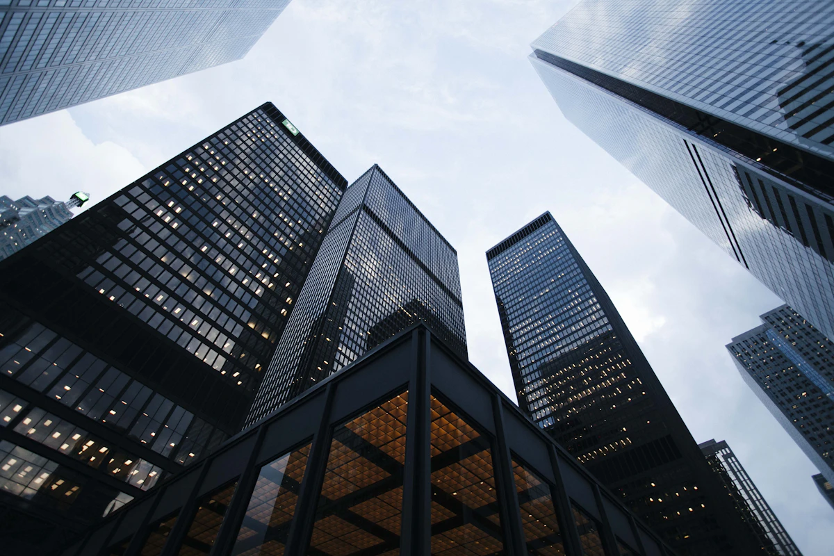 Modern commercial office high-rise towers rising into clear sky
