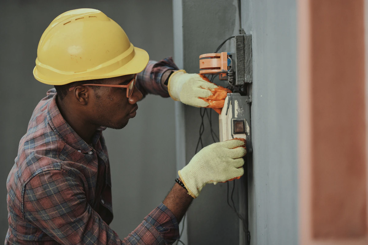 Skilled electrical trade contractor working on system installation